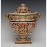 A Derby two-handled Imari vase and cover, decorated with stylised flowers and foliage, lobed base,