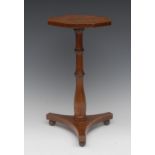 A 19th century mahogany pedestal candlestand, crossbanded hexagonal top, turned column,