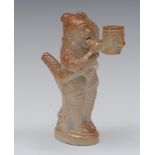 A 19th century brown salt glazed novelty pipe, moulded with comical man,