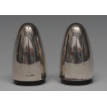 A pair of Elizabeth II silver bullet shaped condiments, salt and pepper, quite plain, 7cm high,