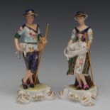 A pair of Royal Crown Derby figures, Shepherd and Shepherdess,
