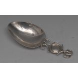 An Arts and Crafts style silver caddy spoon,