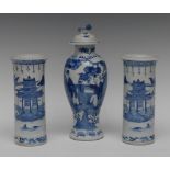 A Chinese baluster vase, decorated in underglaze blue with Chinese boy and prunus,