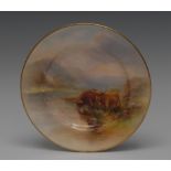 A Royal Worcester circular plate, painted by Harry Stinton, signed, with Highland cattle,