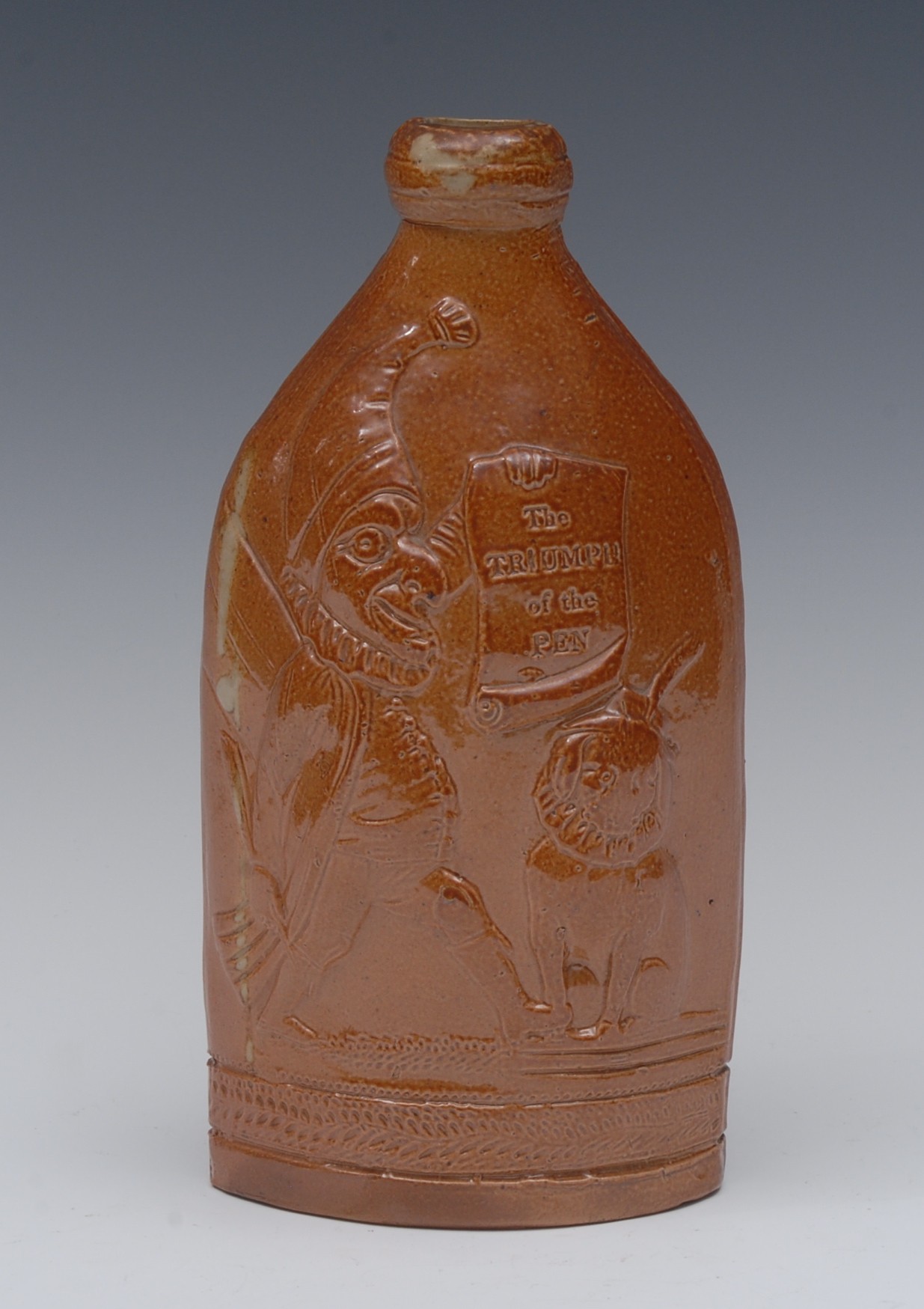 A 19th century brown salt glazed stoneware flask, in relief with Punch and Toby the dog,