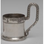 A large Russian silver tea glass holder, embossed with a band of Classical devices,