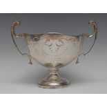 A George V silver two-handled presentation trophy cup, flying acanthus capped scroll handles,