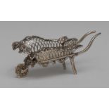 An Edwardian silver novelty miniature wheel barrow,