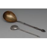 A Russian silver spoon, stylised lotus finial, twisted stem, gilt bowl, 19.