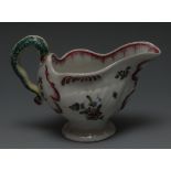 A Worcester dolphin ewer cream boat, moulded with shells and flutes, lamprey moulded handle,