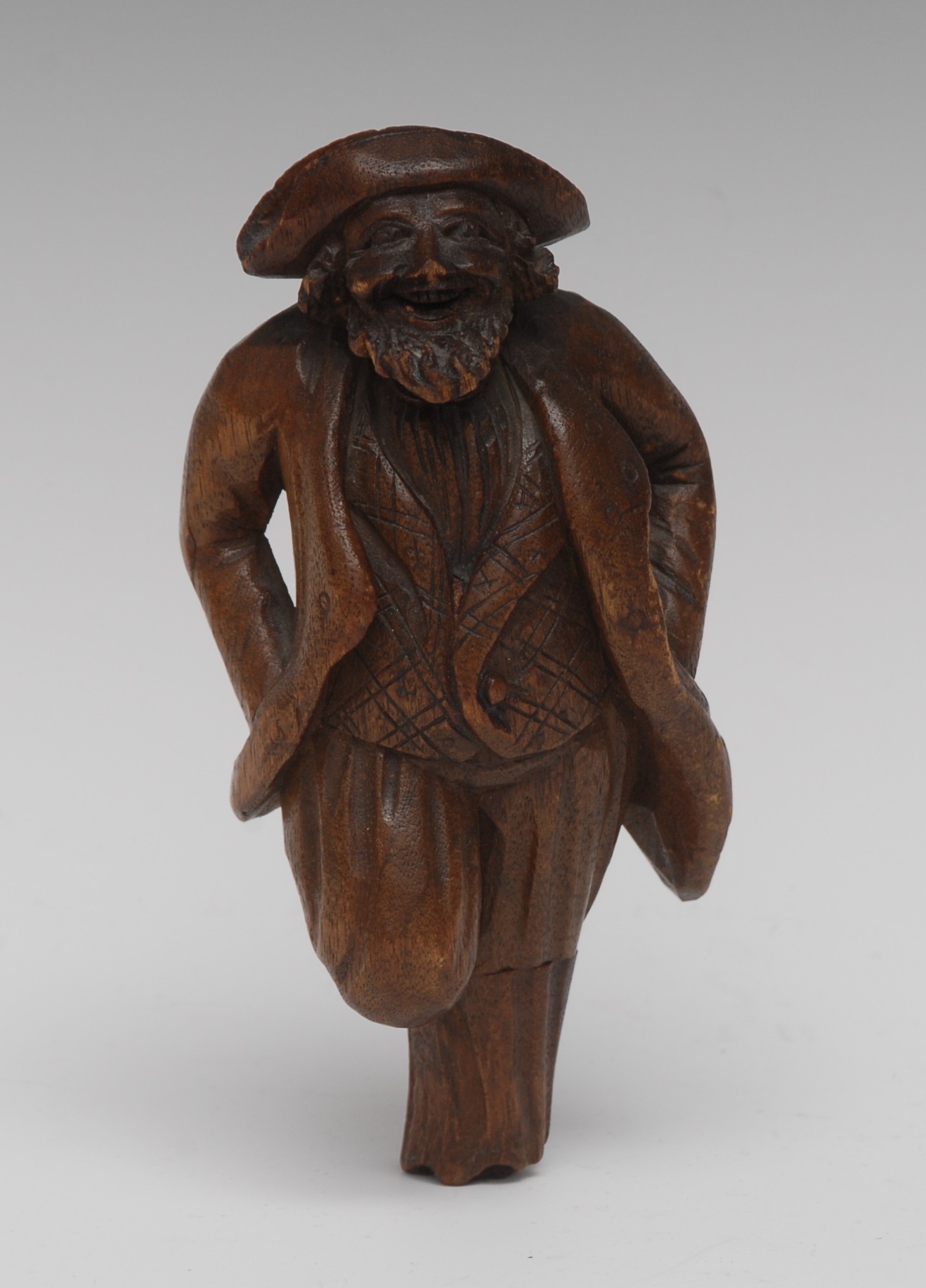 A Black Forest novelty screw-action nutcracker, carved as a pirate, he stands,