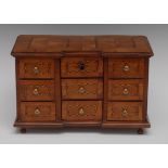 An 18th/early 19th century walnut miniature inverted break centre commode,