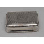 A George III silver waisted rounded rectangular snuff box,