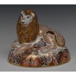 A Royal Crown Derby paperweight, Lion, sat curled with a mouse at his feet, printed mark,