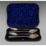 A set of four Victorian silver Old English pattern berry spoons,