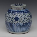 A large Japanese ginger jar and cover, decorated with scrolling lotus and foliage,