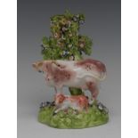 A Derby cow and calf group, before bocage, with tan patches, 14.5cm high, c.