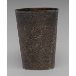 A 19th century Indian silver coloured metal tapered cylindrical beaker,