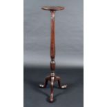 A 19th century mahogany tripod torchere or statuary pedestal,