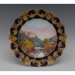 A Royal Crown Derby wavy edge plate, painted by E Ellis, signed with High Tor, Matlock,