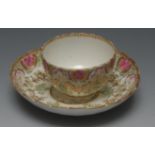 A Worcester fluted tea bowl and saucer, decorated in the manner of James Giles,