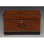 A George III satinwood rectangular tea caddy, inlaid with oval shell paterae,