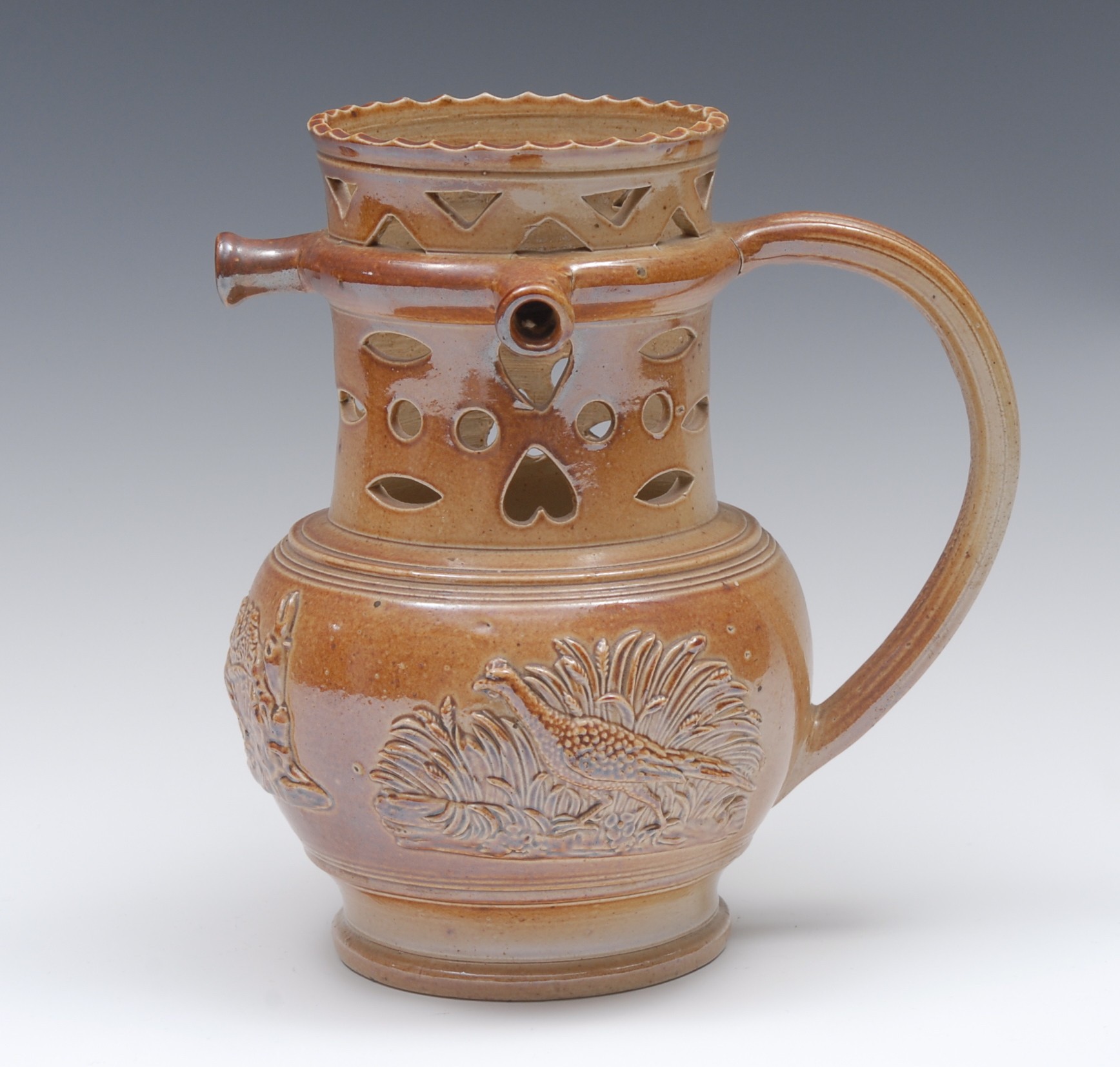 A 19th century brown salt glazed stoneware puzzle jug,