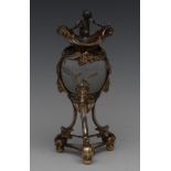 An unusual Rococo Revival gilt and silvered metal mantel urn, crested by a scantily clad putto,