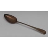A George III Provincial silver Old English pattern basting spoon, 28cm long, Hampston,
