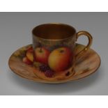 A Royal Worcester coffee cup and saucer, the can painted by Stinton, the saucer by Townsend,