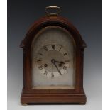 An Edwardian mahogany bracket clock, 15cm arched silvered dial with a chapter of Roman numerals,