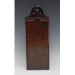 A George III rectangular candle box, possibly chestnut, shaped and pierced cresting,