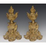 A pair of Louis XV style gilt metal chenets, boldly cast as Rococo urns, acanthus scroll bases, 39.