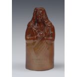 A 19th century Doulton Lambeth salt glazed stoneware figural reform flask, Brougham Reform Cordial,