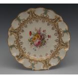 A Royal Crown Derby wavy edge plate, painted by E Ellis,