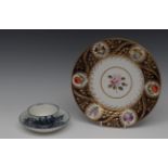 A Worcester Three Ladies tea bowl and saucer, printed with oriental figures and peonies,