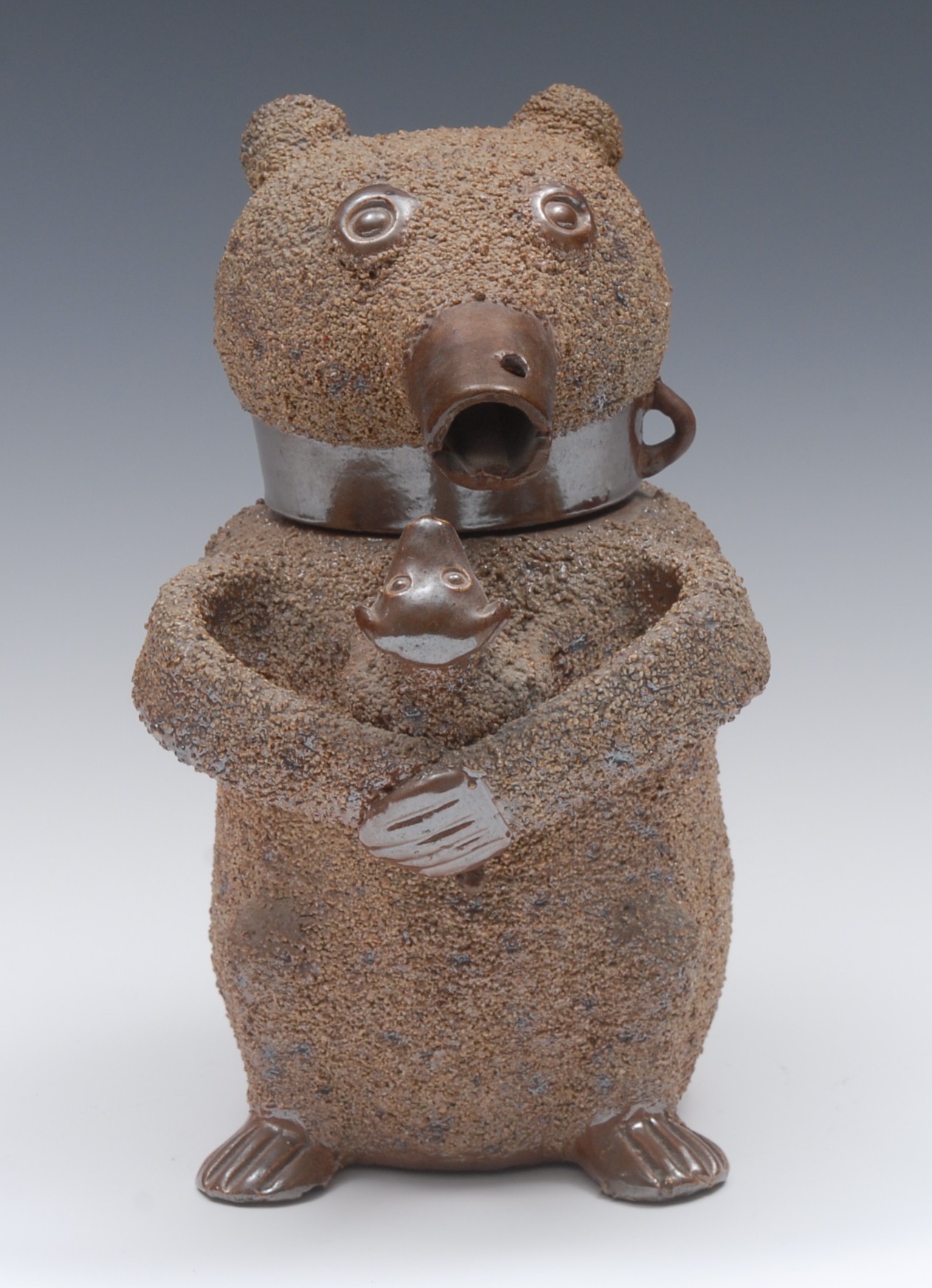 A Derbyshire/Nottinghamshire brown salt glazed stoneware bear baiting jug and cover,