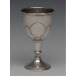 An Elizabeth II silver pedestal goblet, hemi-ovoid bowl engraved with a vacant laurel cartouche, 12.