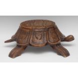 An unusual 19th century oak novelty spittoon, carved as a tortoise,