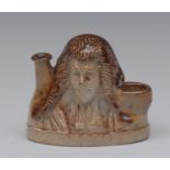 A mid 19th century brown salt glazed stoneware inkwell, as a wigged gentleman, 7cm high, c.