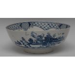 A Lowestoft circular bowl, printed in blue with pagoda, huts, trees and foliage,