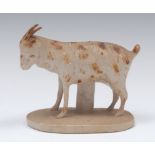 A Brampton brown salt glazed stoneware model of a goat, standing, brown patch markings, oval base,