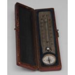 A Victorian travelling combination thermometer and compass, silvered register, morocco case, 10.