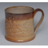 A 19th century Chesterfield brown salt glaze stoneware mug, in relief with huntsman, hounds and fox,