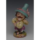 A Royal Worcester Derby type Mansion House Dwarf, with moustache, he stands left hand on his hip,