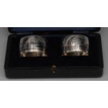 A pair of Middle Eastern silver and niello napkin rings,