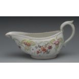 A Derby Patch Mark sauce boat, painted in coloured enamels with summer flowers,