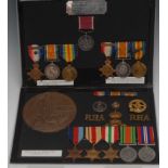 Medals, Family Medals, a group of four, with original documents, two killed-in-action,