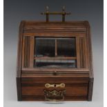 A Victorian Aesthetic Movement oak novelty work box, as a coal scuttle,