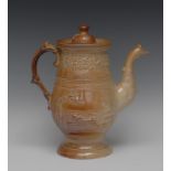 A 19th century brown salt glazed stoneware coffee pot, in relief with running hare,